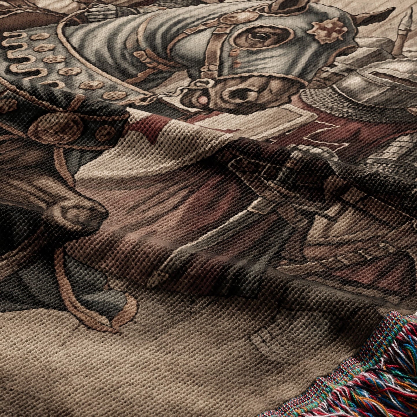 Woven tapestry depicting a medieval knight on horseback.