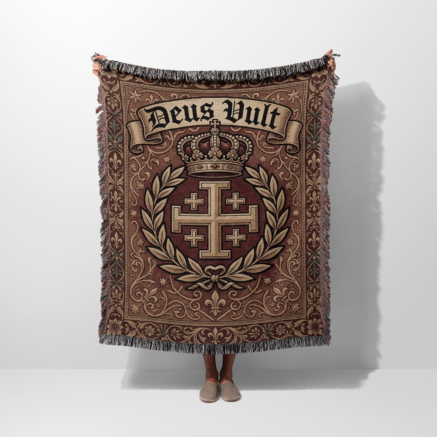 Woven tapestry blanket with crown, Jerusalem cross, and "Deus Vult" text.