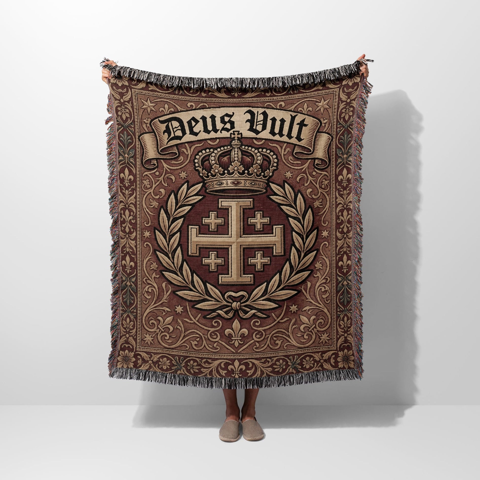Woven tapestry blanket with crown, Jerusalem cross, and "Deus Vult" text.