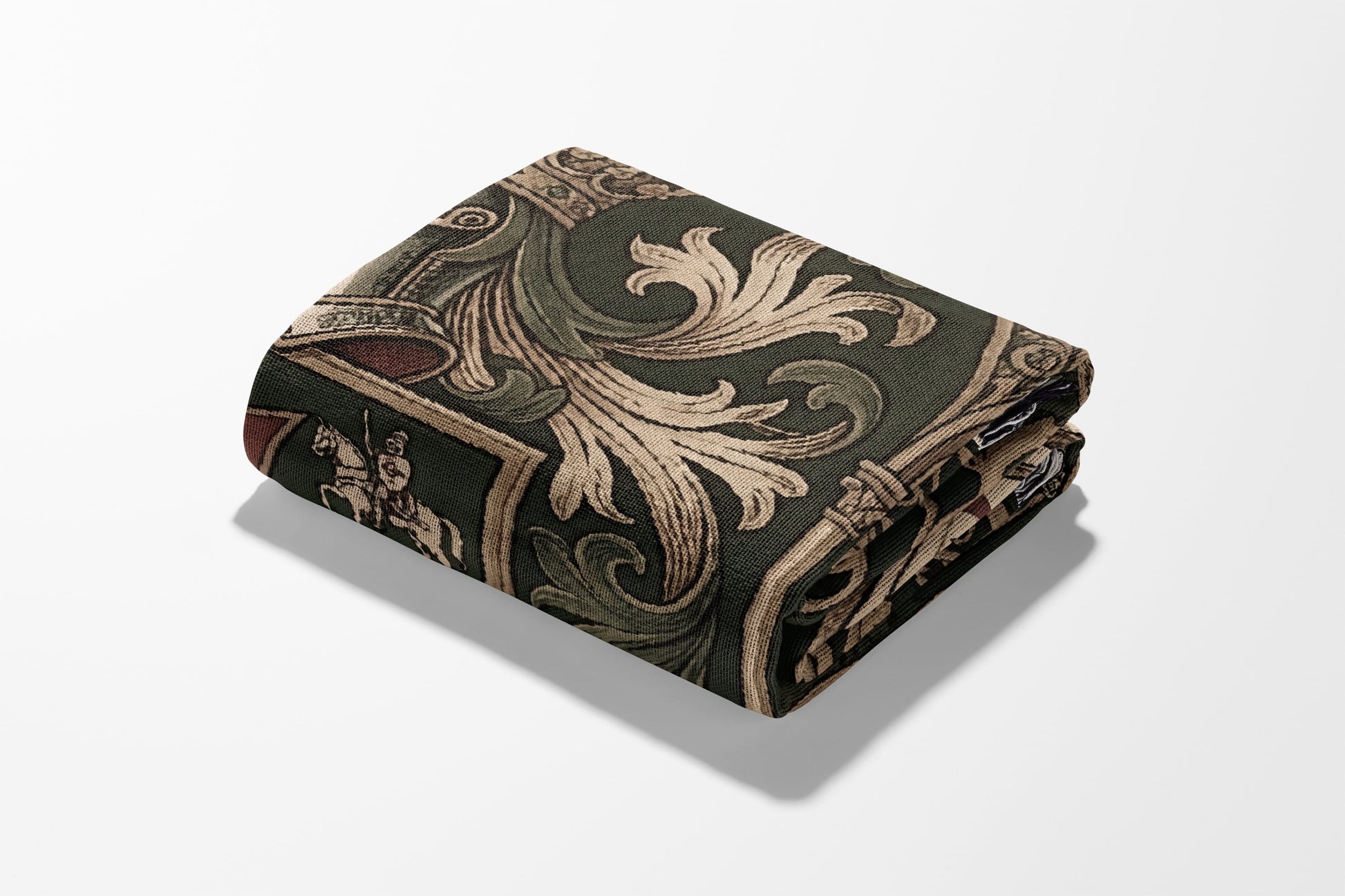 Folded fabric with a dark green base and ornate scrolling gold and brown medieval pattern.