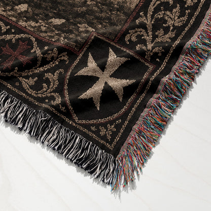 Tapestry blanket with Knights Templar cross and colorful fringe.
