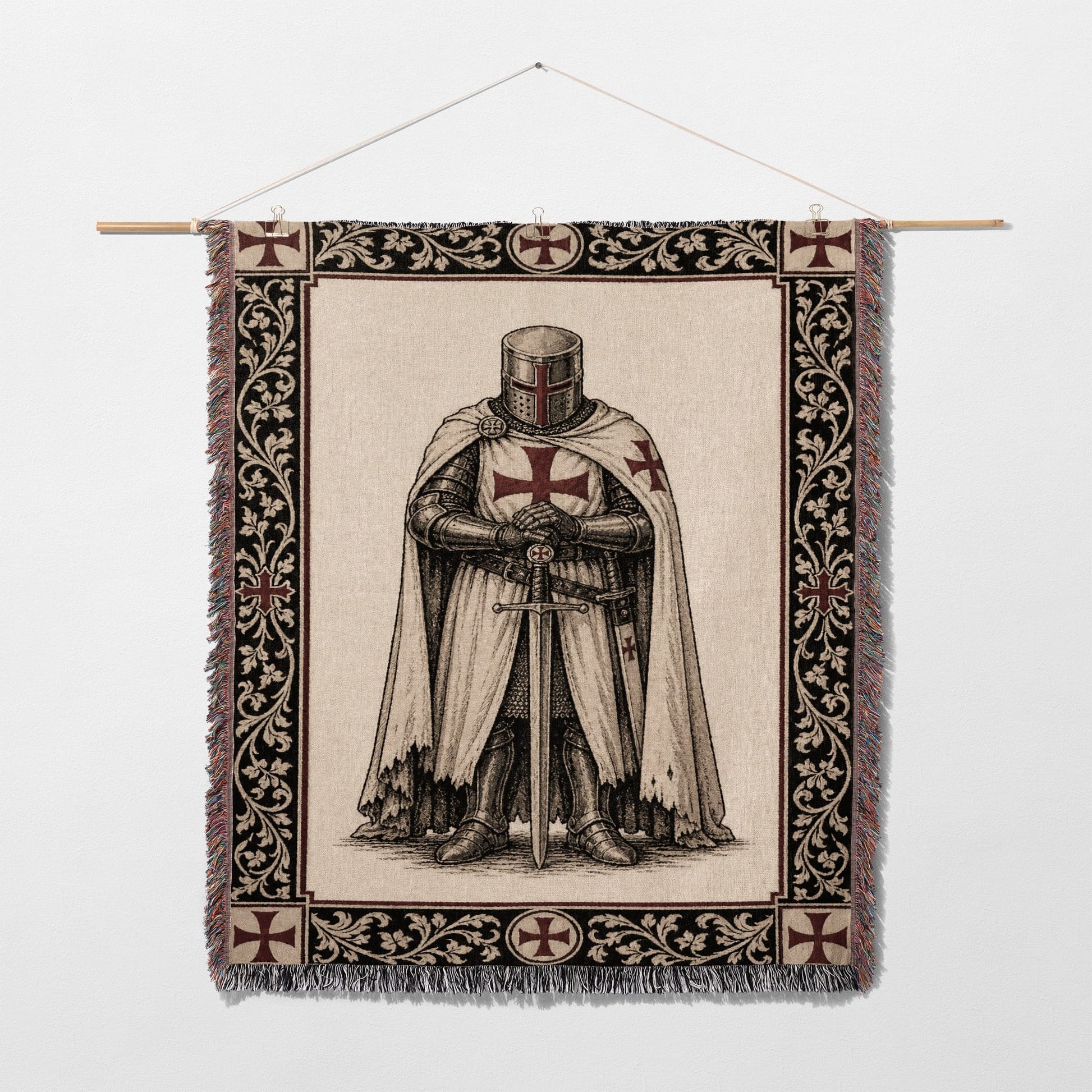 Templar knight tapestry with sword and shield, framed by ornate border.