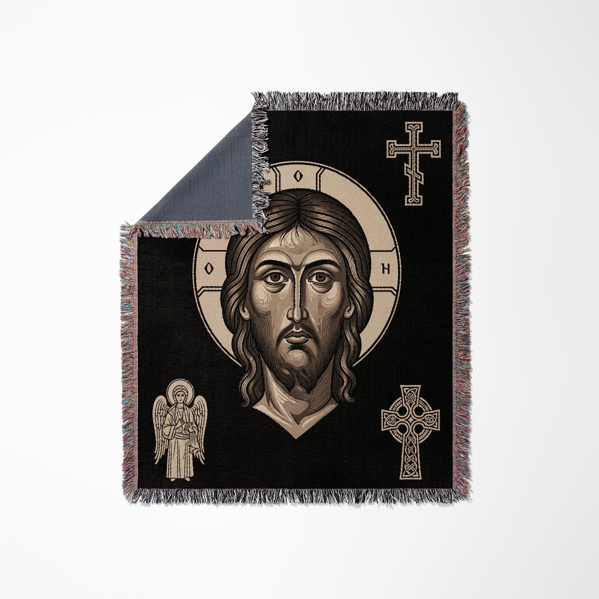 Jesus Christ icon woven into a black throw blanket with crosses and an angel.