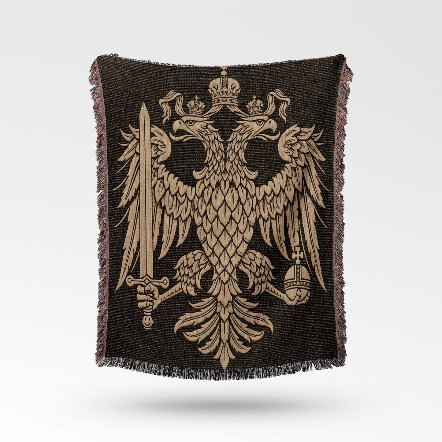 Black throw blanket with golden double-headed eagle crest, sword, and crown.