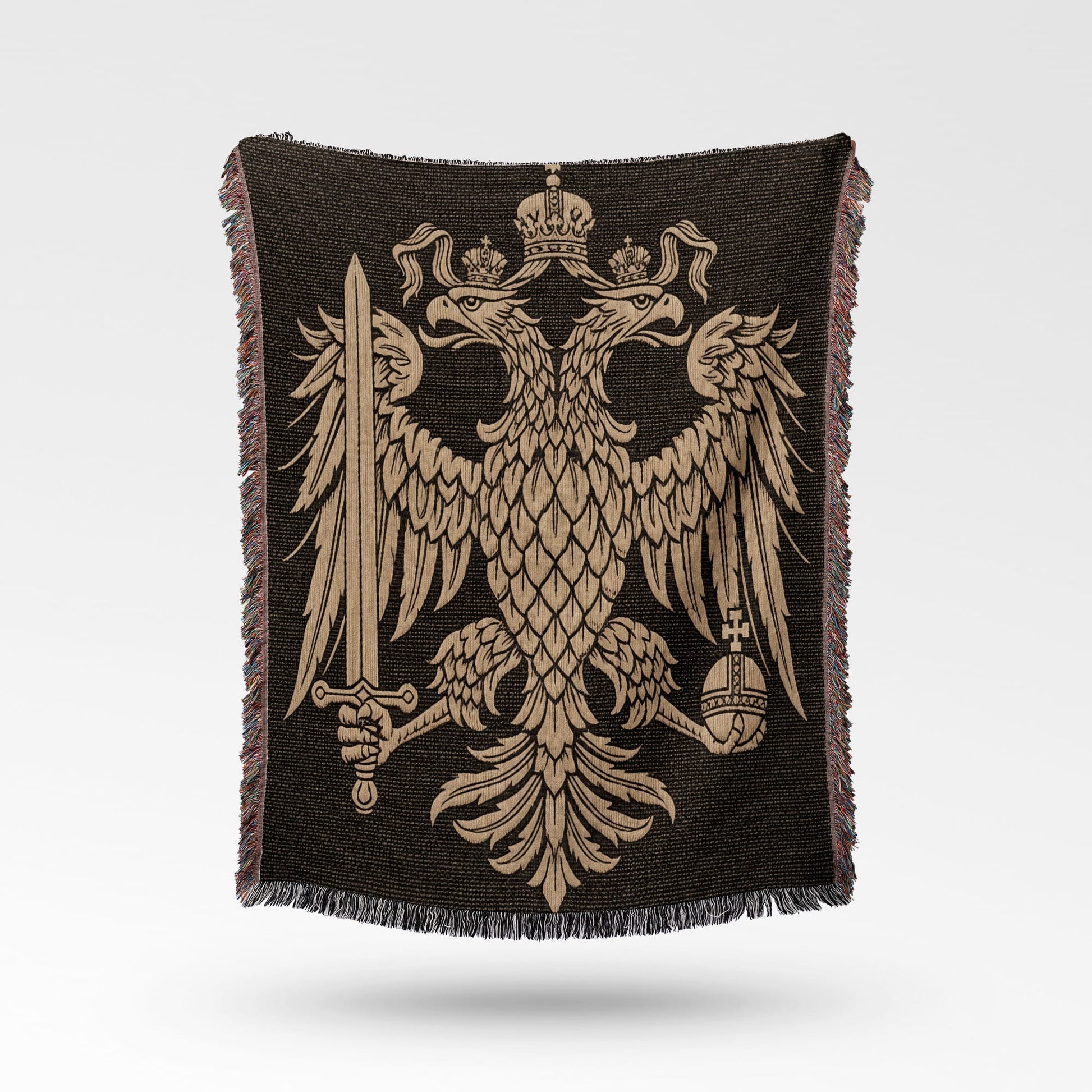 Black throw blanket with golden double-headed eagle crest, sword, and crown.