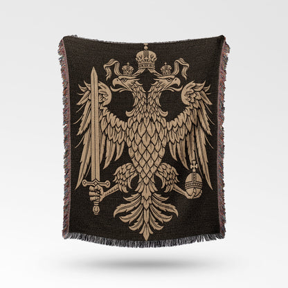 Black throw blanket with golden double-headed eagle crest, sword, and crown.