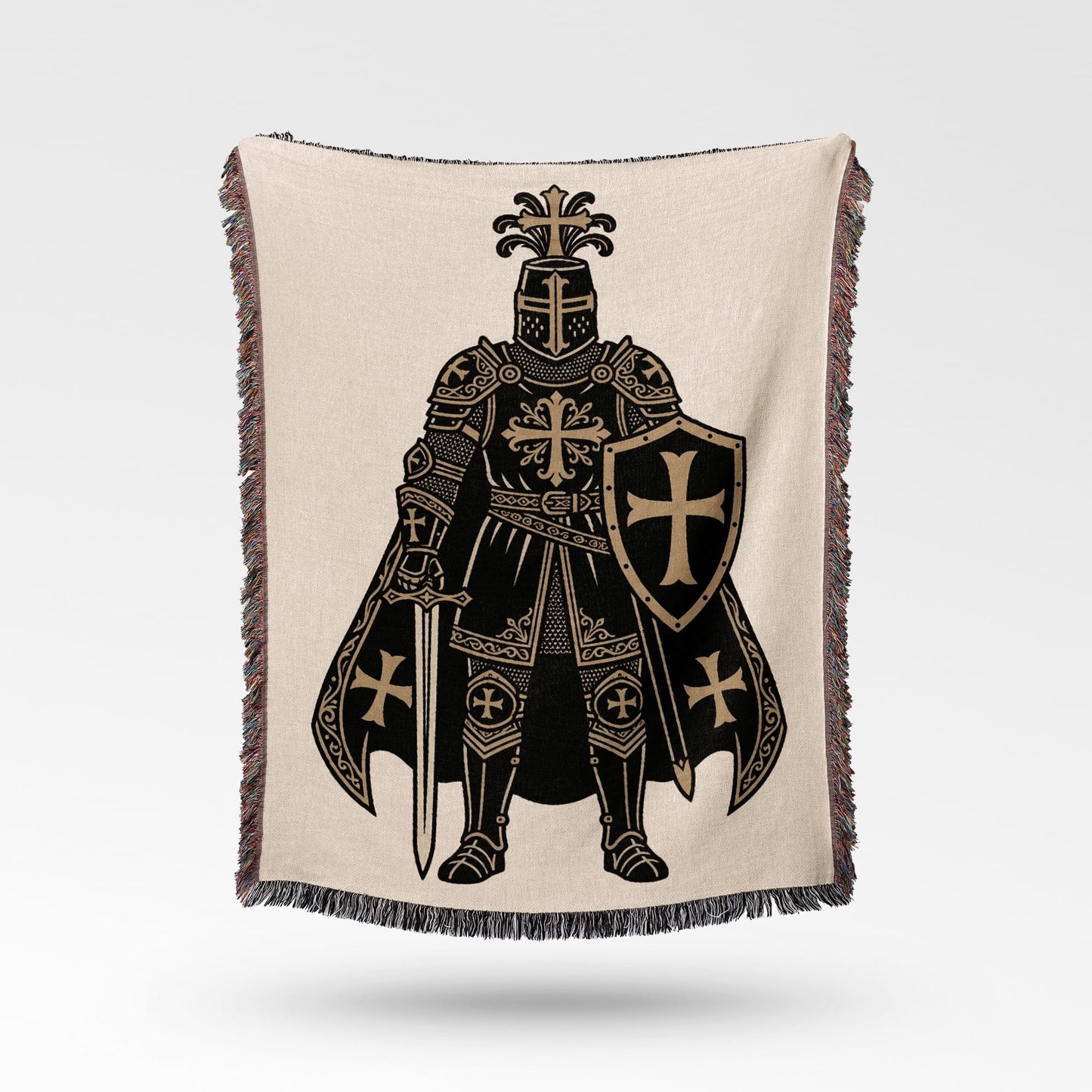 Knight in armor with sword and shield on a woven blanket.