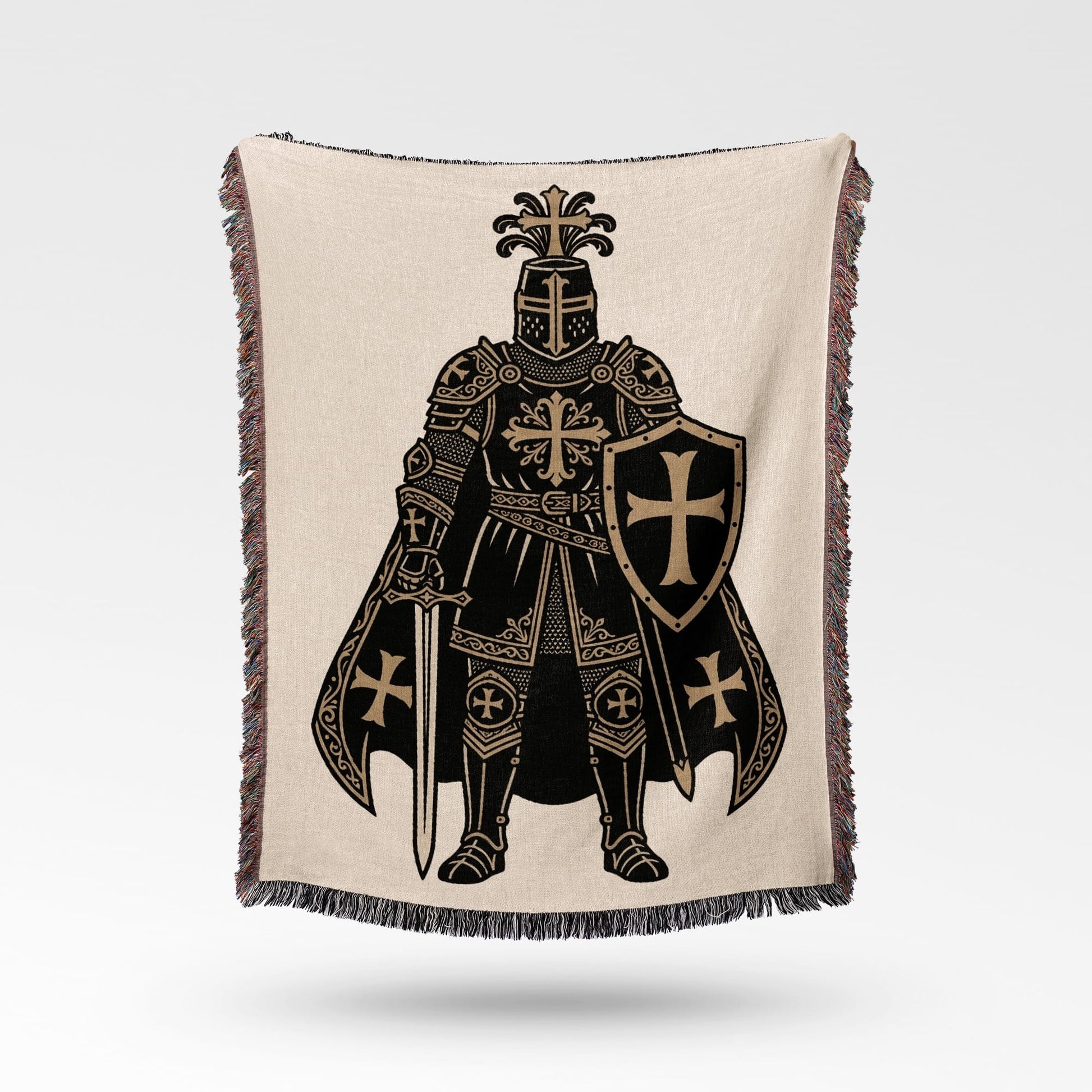 Knight in armor with sword and shield on a woven blanket.