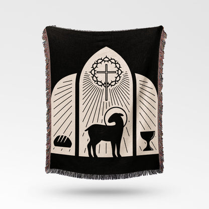 Black blanket with a lamb, cross, bread, and chalice design.