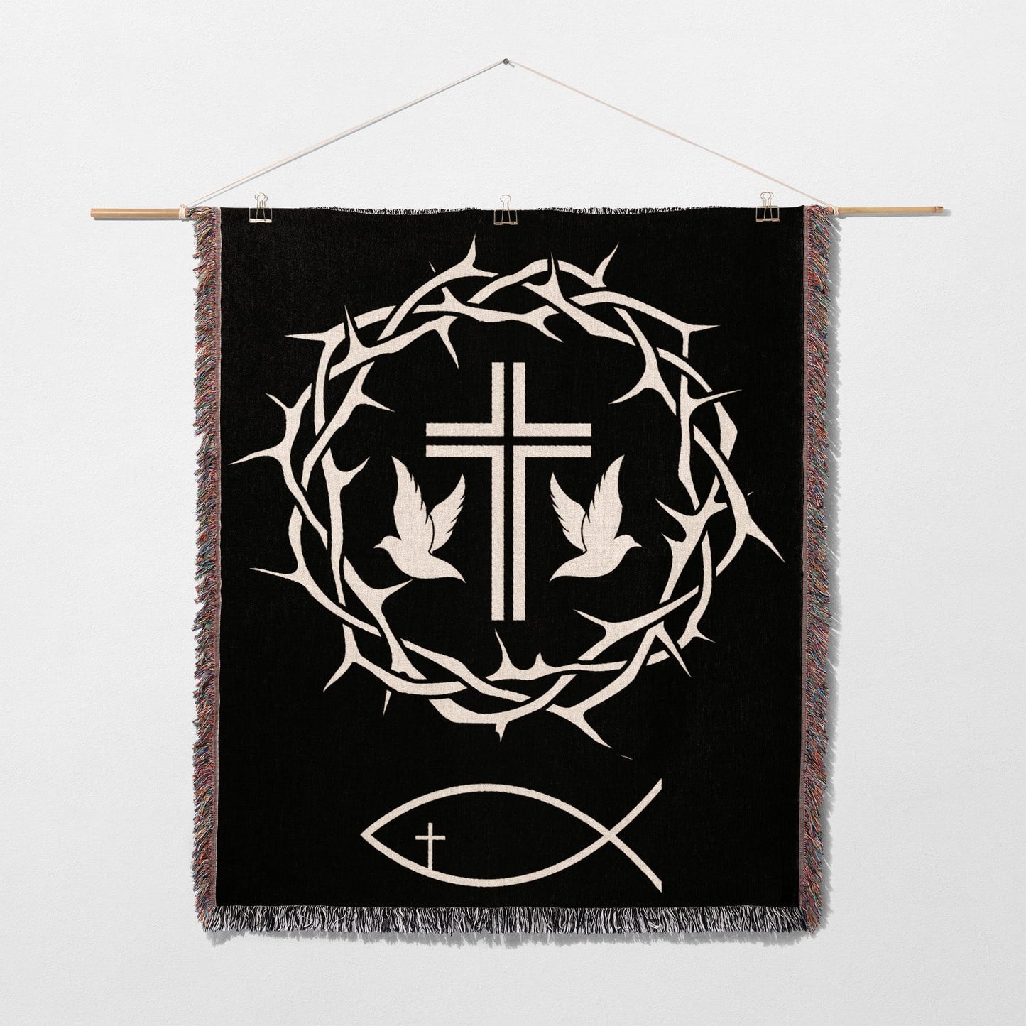 Black tapestry with crown of thorns, cross, and two doves.