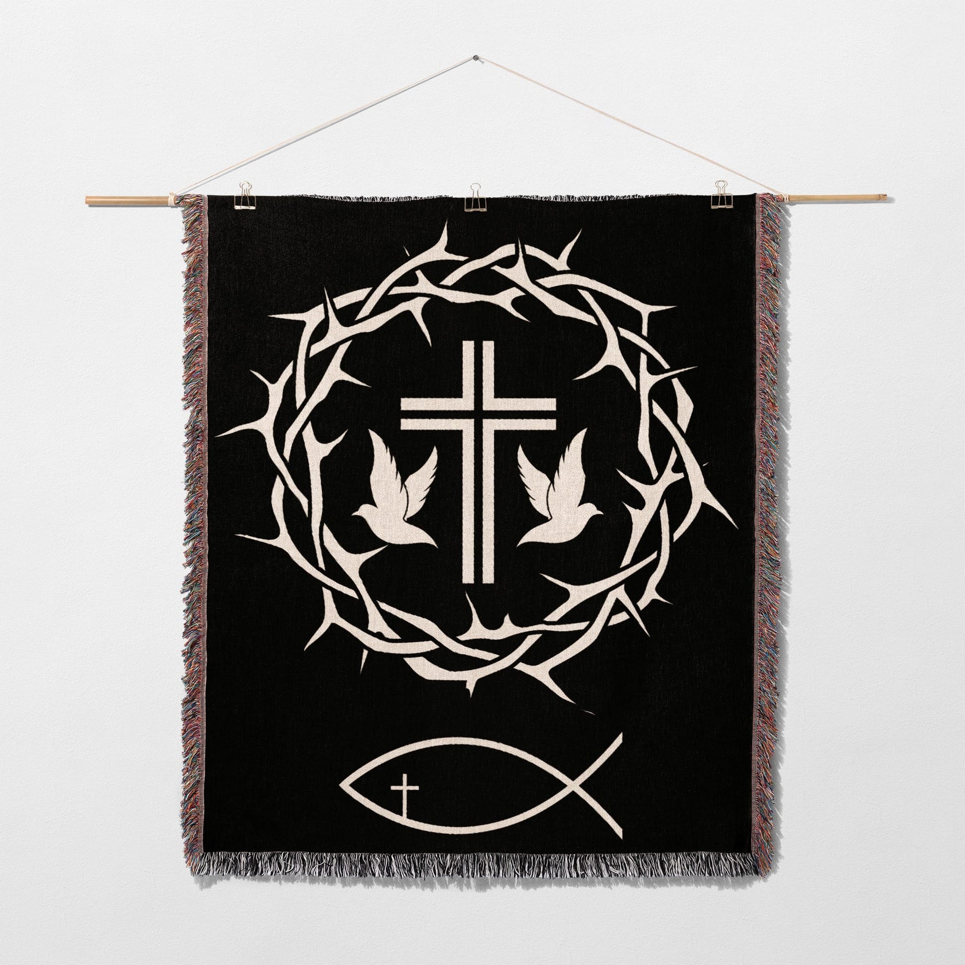Black tapestry with crown of thorns, cross, and two doves.