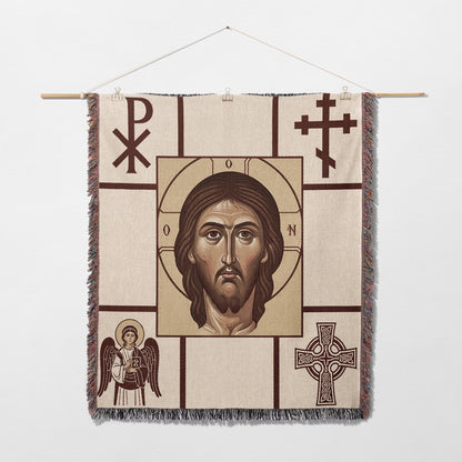 Orthodox icon of Christ Pantocrator on woven tapestry with Celtic cross and angel.