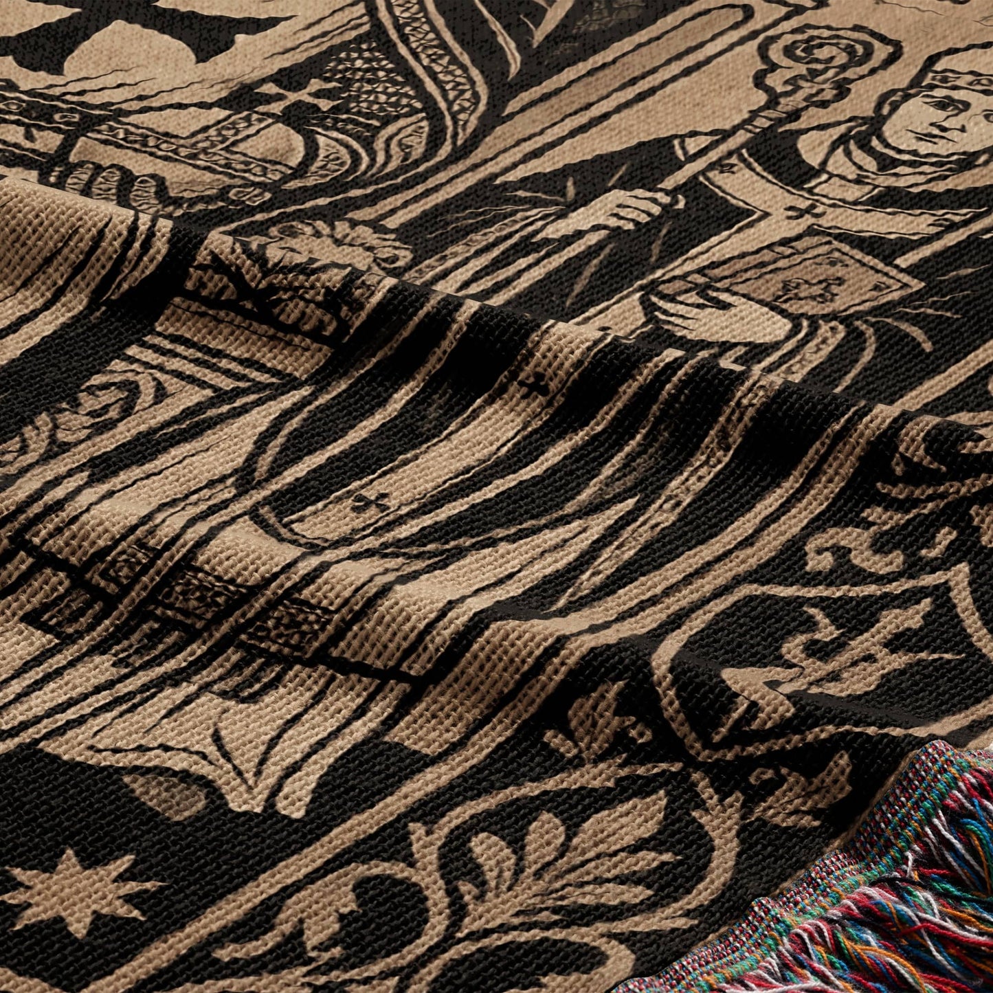 Tapestry with medieval figure holding staff and book, fringed edge.