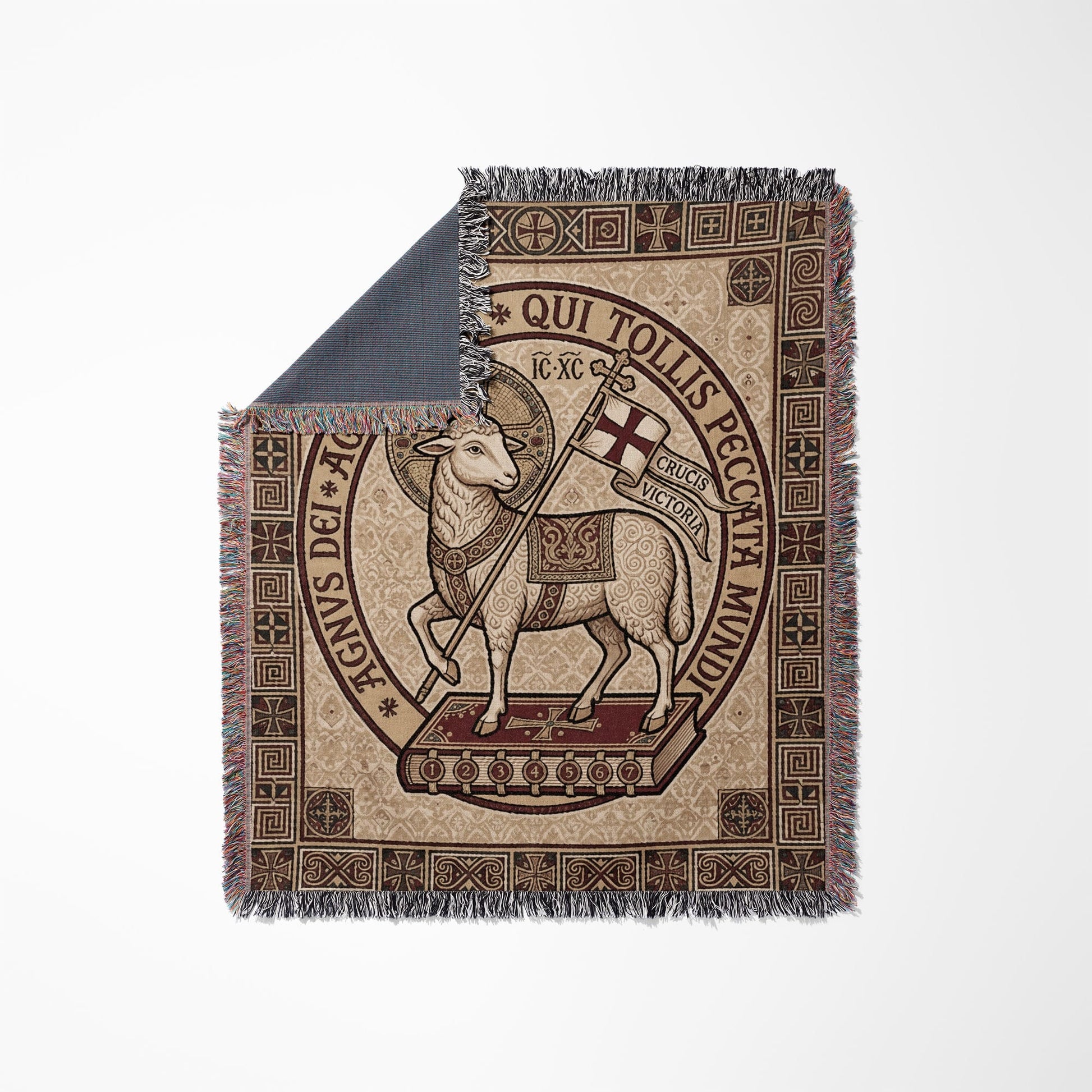 Lamb of God symbol on woven tapestry with Latin text and fringe.