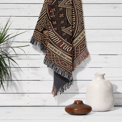 Tapestry with Celtic knot design and "Glory to God" text hangs on a white wooden wall.