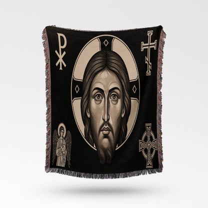 Tapestry with Jesus' face, angels, and Christian symbols.