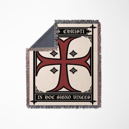 Cream throw blanket with a red Templar cross and Latin inscription.