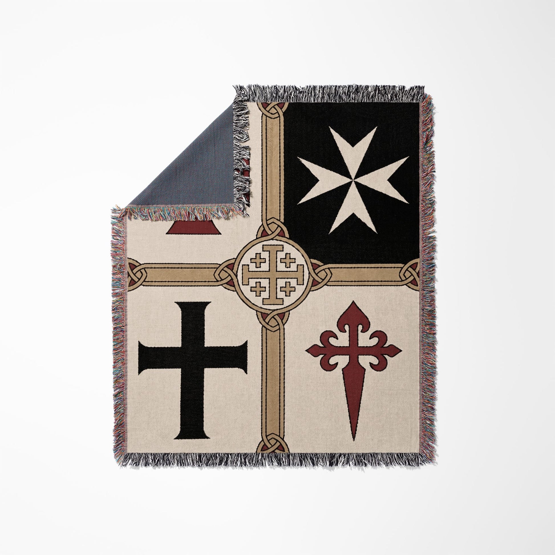 Black and white blanket with four different crosses and ornate border.