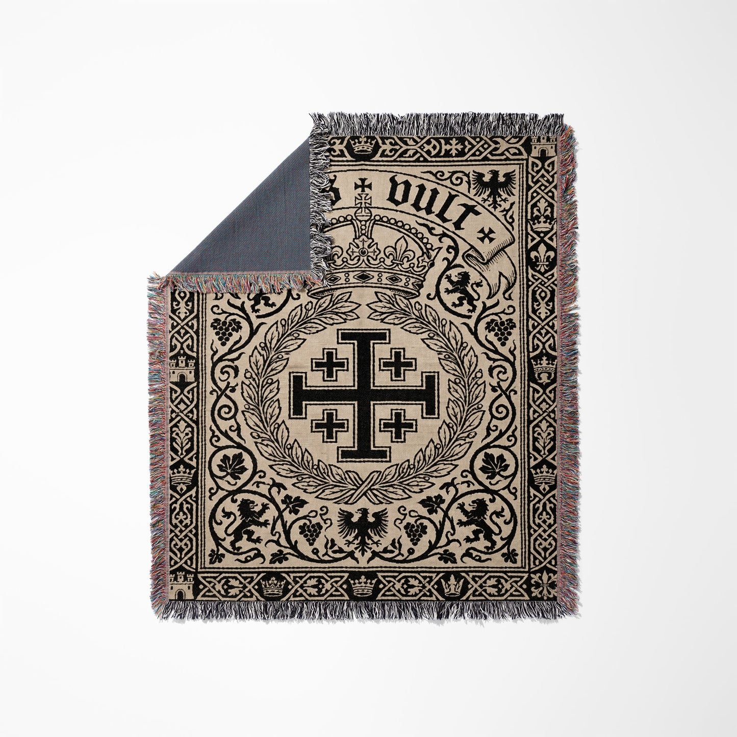 Tapestry throw with black and tan medieval design featuring Jerusalem Cross, crown, lions, and eagles.