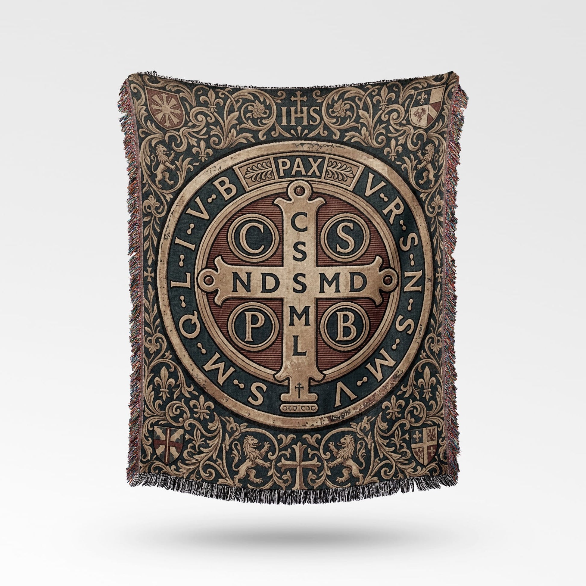 Tapestry throw with St. Benedict's medal and ornate scrollwork pattern.
