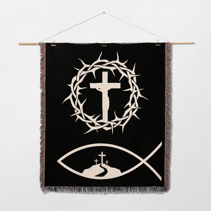 Black tapestry with white crown of thorns, crucifix, and fish symbol.