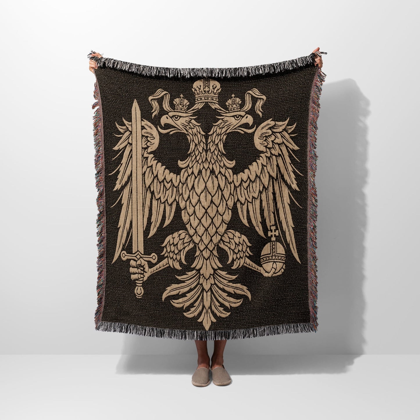 Tapestry throw blanket featuring a double-headed eagle crest with swords and crown.