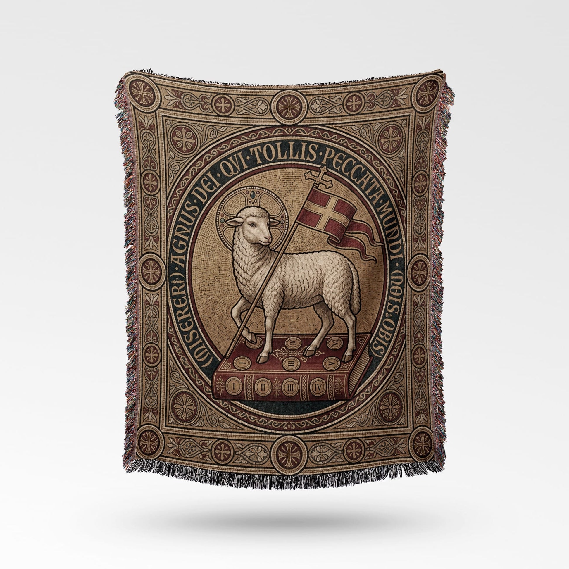 Agnus Dei on book with Latin text and religious border on woven blanket.