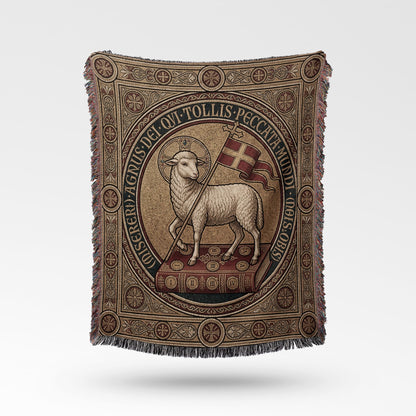 Agnus Dei on book with Latin text and religious border on woven blanket.