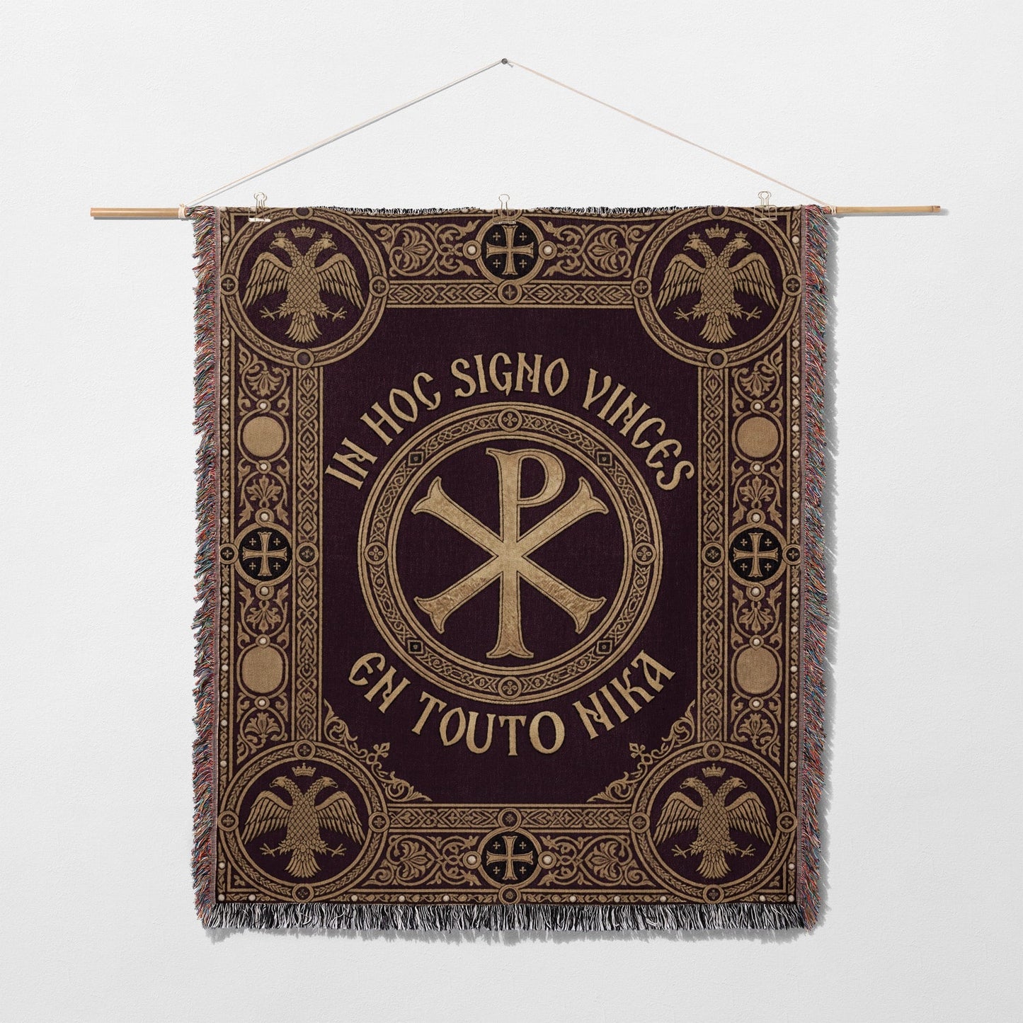 Tapestry with a Chi Rho symbol and Latin text "IN HOC SIGNO VINCES".