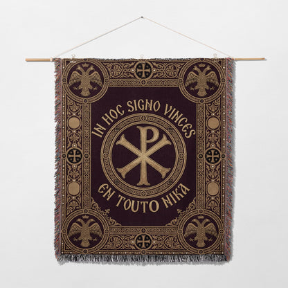 Tapestry with a Chi Rho symbol and Latin text "IN HOC SIGNO VINCES".