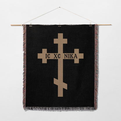Black tapestry with gold Orthodox cross and text IC XC NIKA.