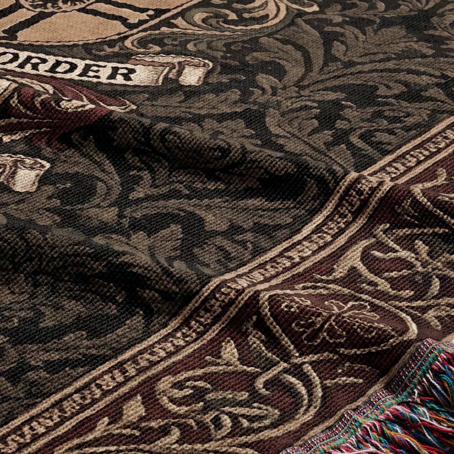 Woven blanket with ornate pattern and the word "ORDER".