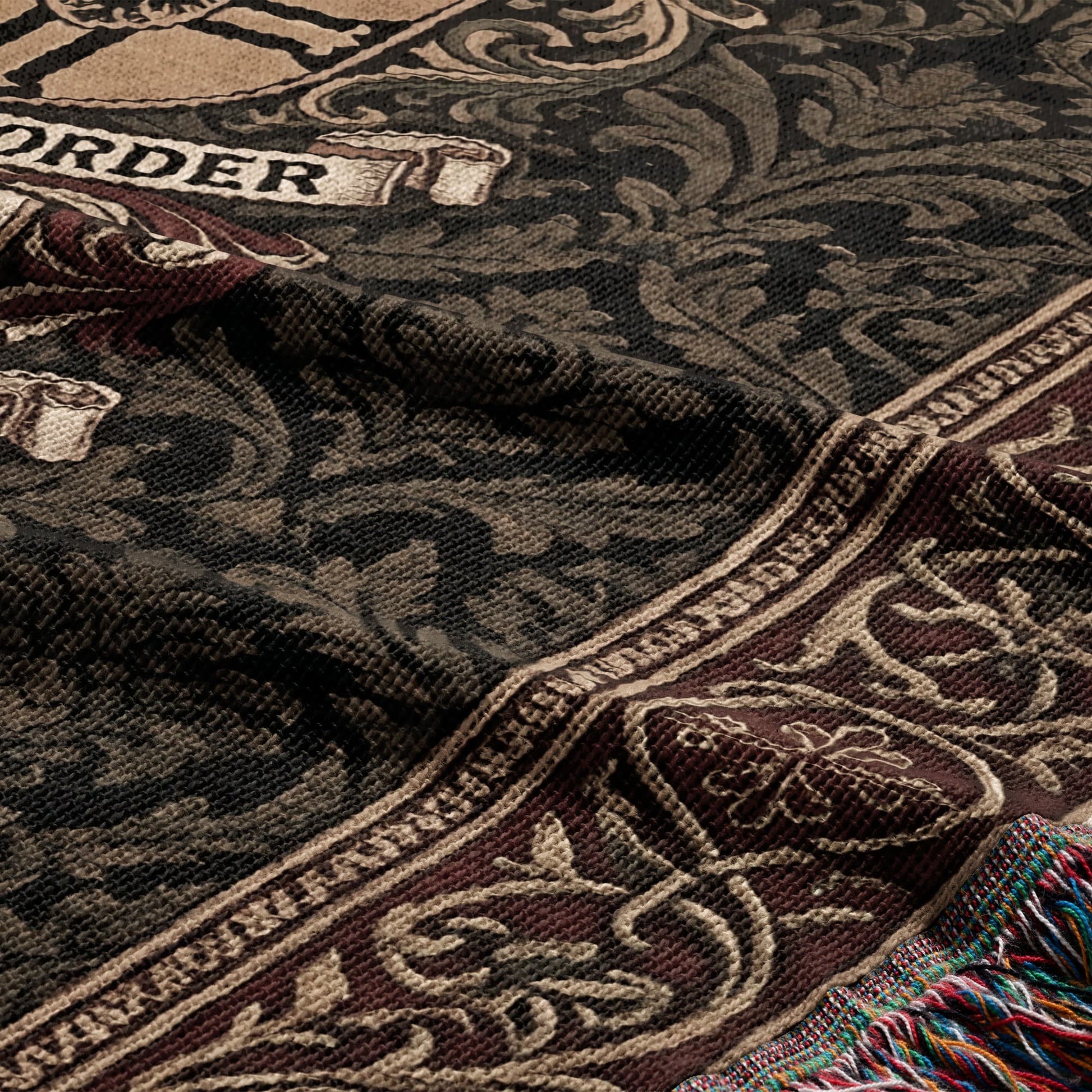 Woven blanket with ornate pattern and the word "ORDER".
