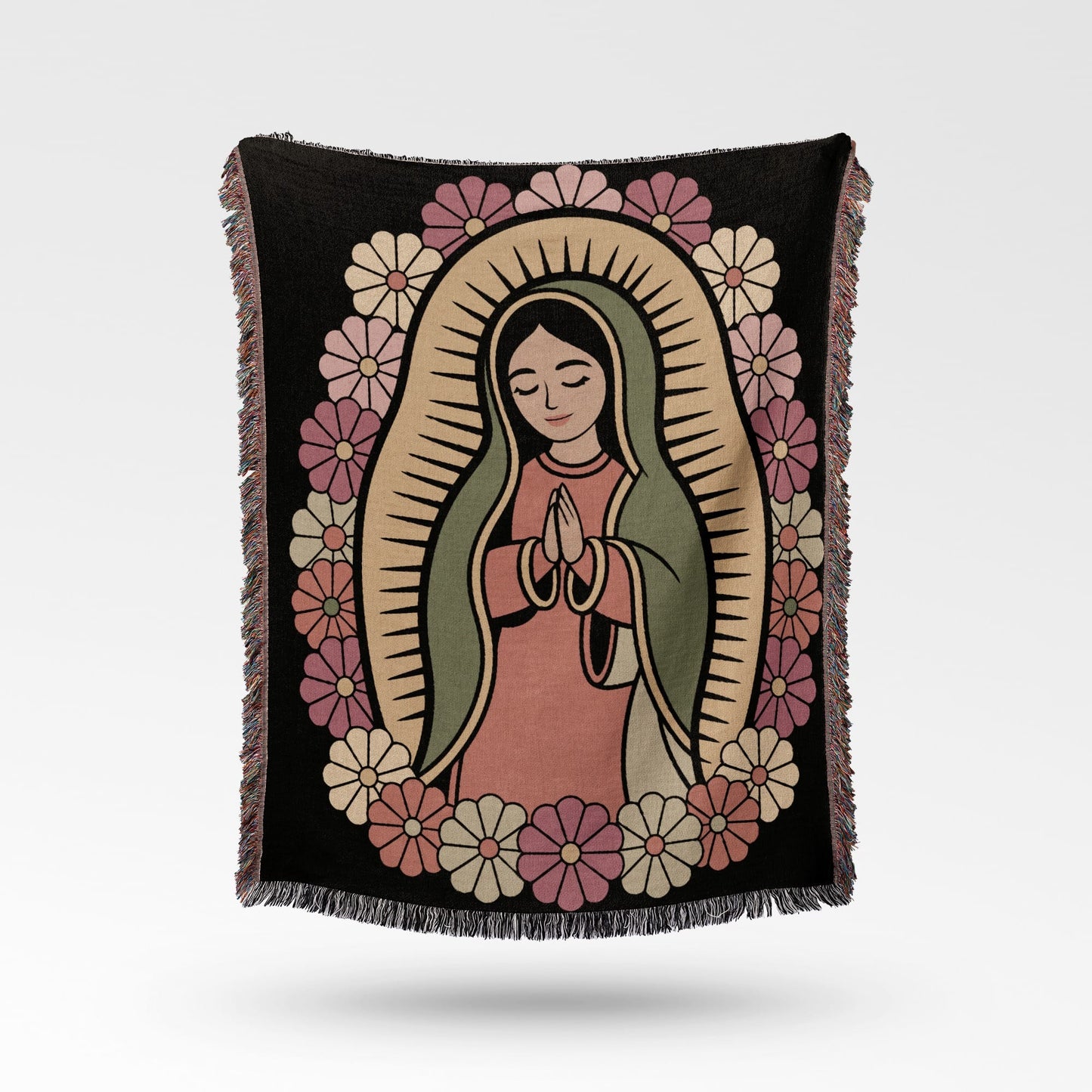 Blanket featuring an illustration of the Virgin Mary surrounded by flowers.