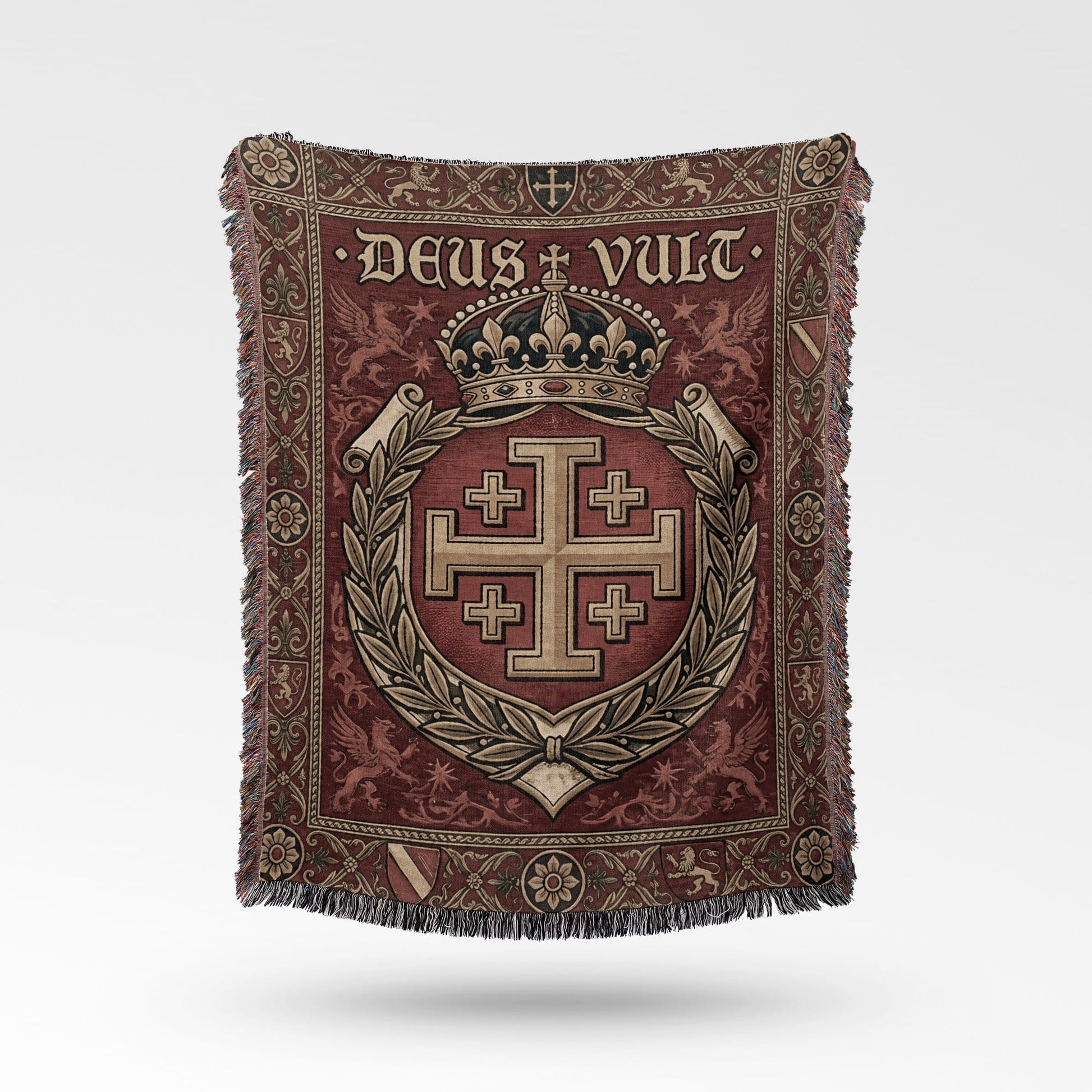 Tapestry throw with a Jerusalem cross, crown, and "Deus Vult" text.