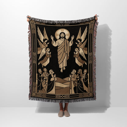 Religious scene of Jesus with angels and people, a woven blanket.