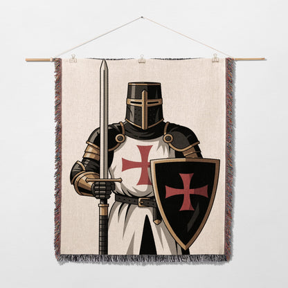 Knight in armor holding sword and shield with red cross insignia.