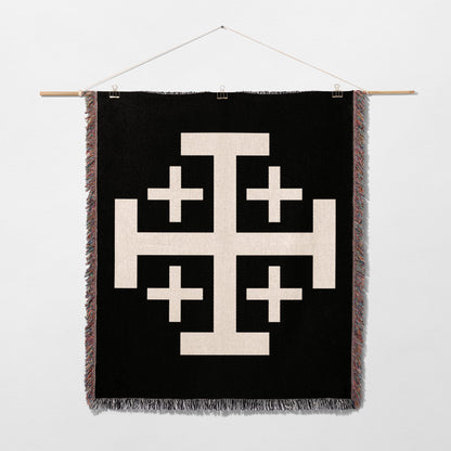 Black blanket with large white Jerusalem cross design.