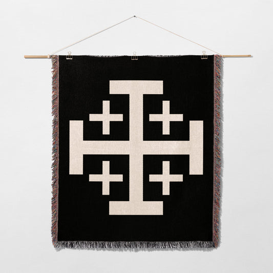 Black blanket with large white Jerusalem cross design.