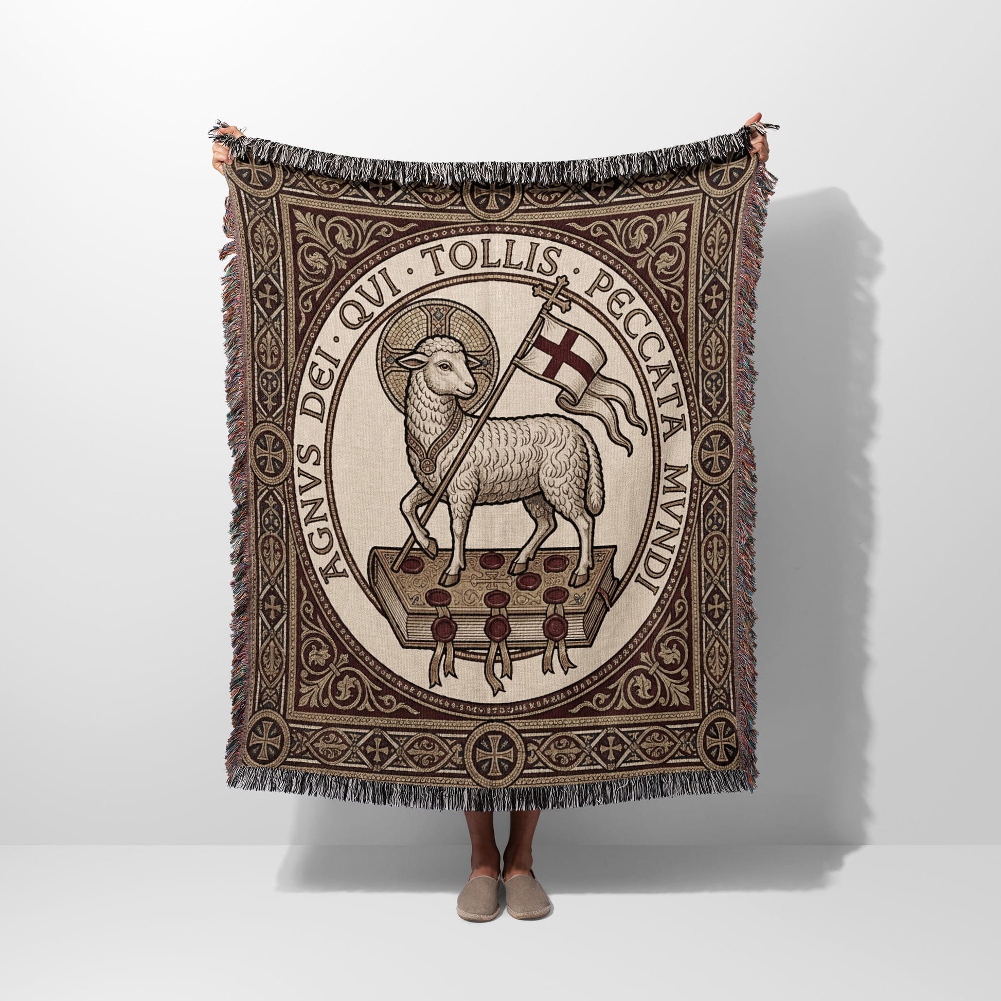 Lamb of God tapestry blanket with Latin text and fringe.