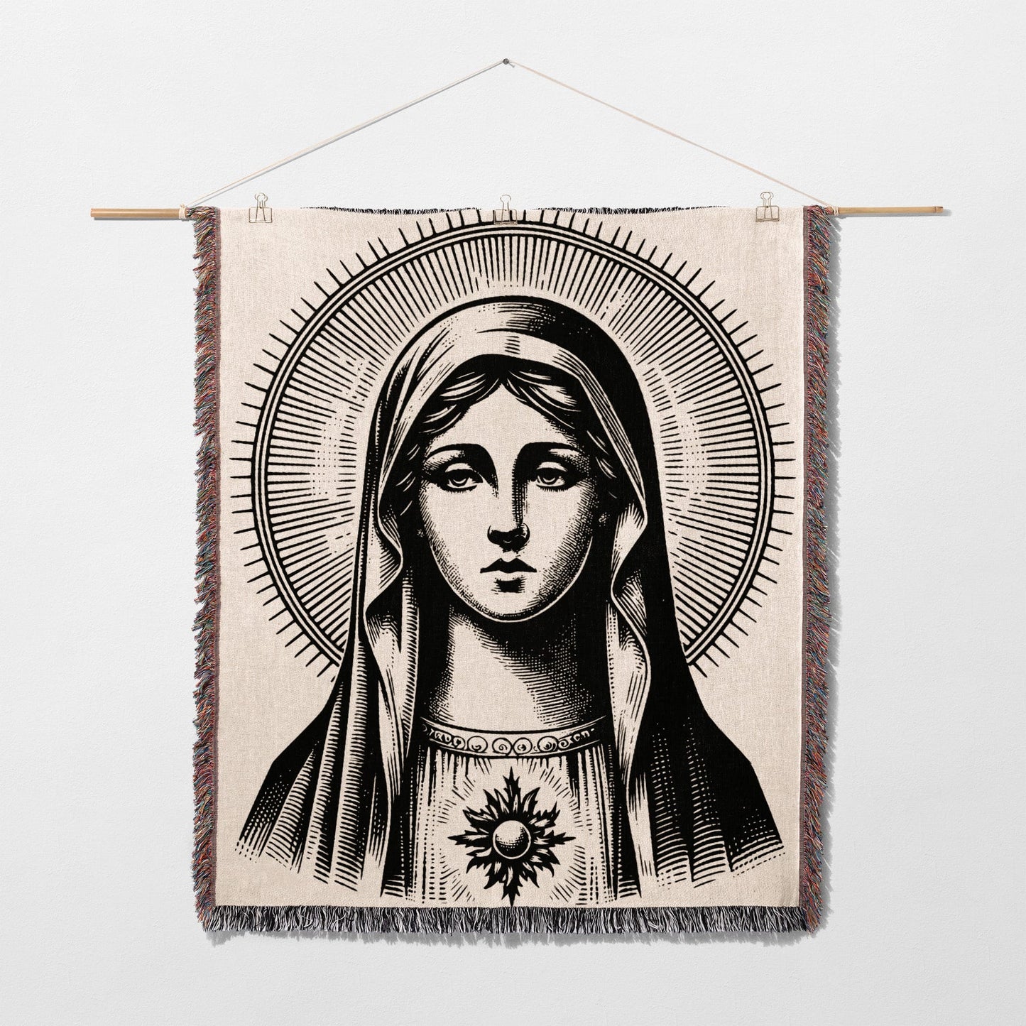 Tapestry depicting the Virgin Mary with a radiant halo and sunburst emblem.