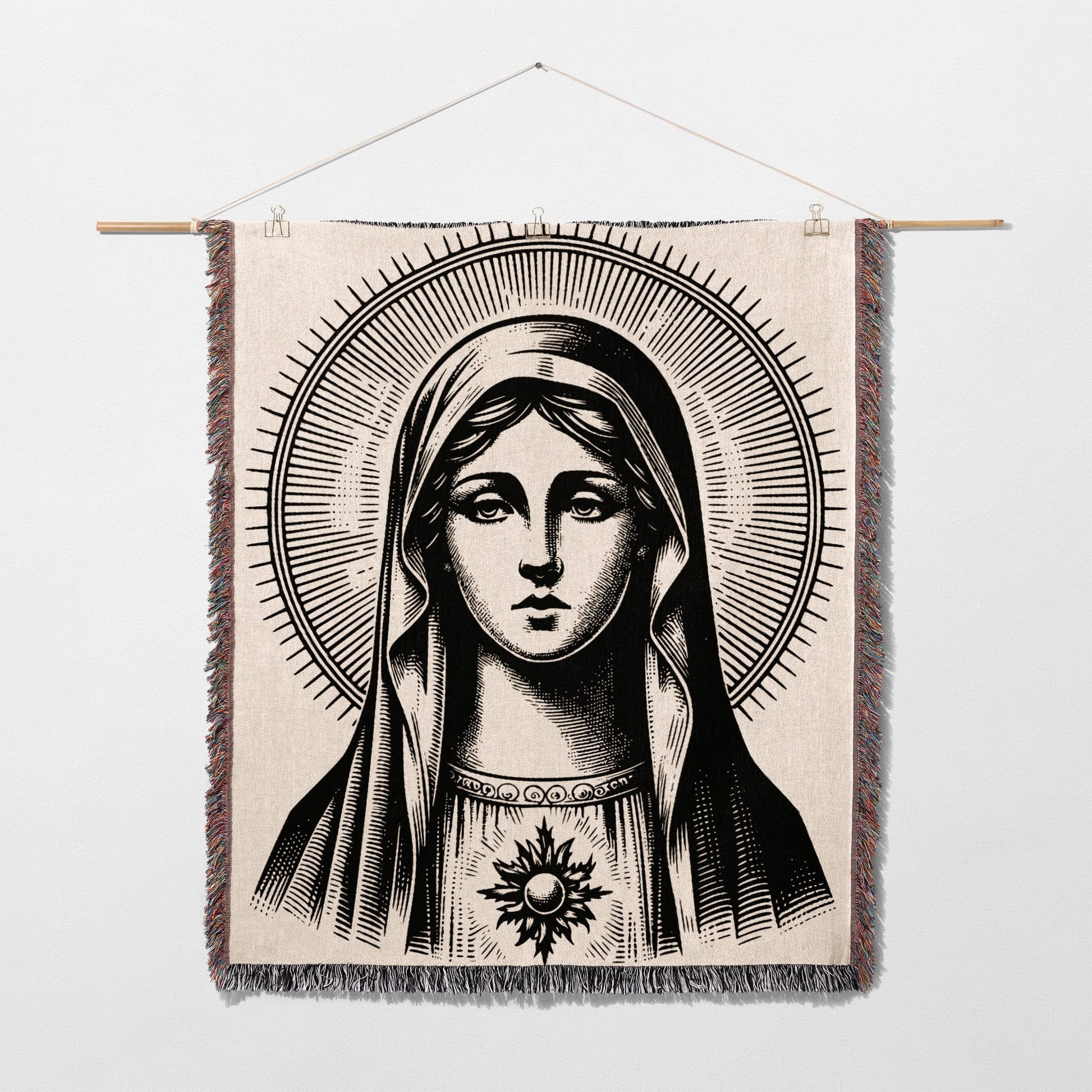 Tapestry depicting the Virgin Mary with a radiant halo and sunburst emblem.