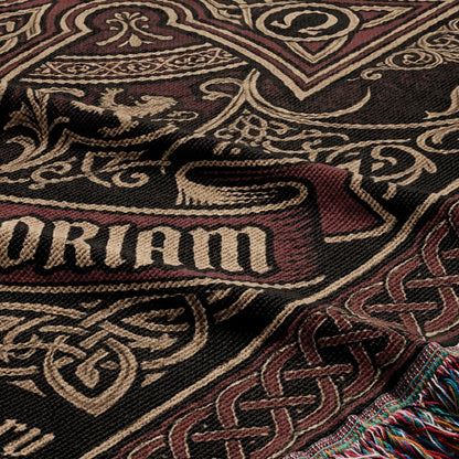 Woven blanket with intricate Celtic knotwork and "ORIAM" text.