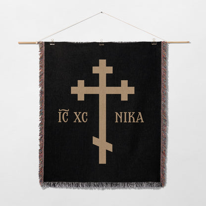 Black tapestry with a gold Orthodox cross and "IC XC NIKA" text.